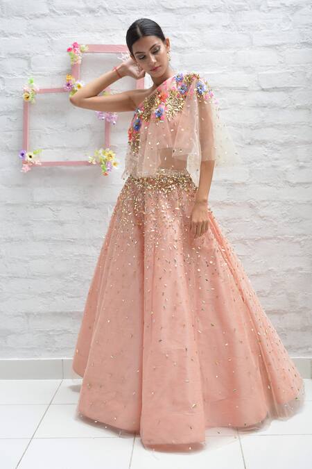 Shop_Parul Gandhi_Peach Net With Silk Asymmetric Embroidered One Shoulder Lehenga Set _at_Aza_Fashions