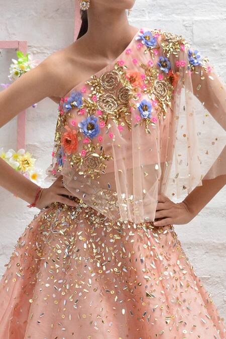 Parul Gandhi_Peach Net With Silk Asymmetric Embroidered One Shoulder Lehenga Set _at_Aza_Fashions