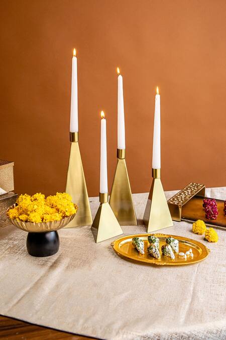 Logam_Gold Stainless Steel Oro Candle Holder Set Of 4_Online_at_Aza_Fashions