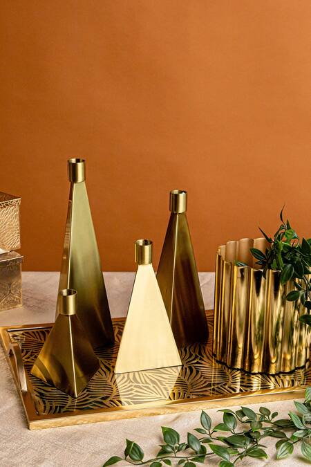 Logam_Gold Stainless Steel Oro Candle Holder Set Of 4_at_Aza_Fashions