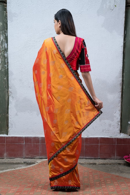 Premium Photo | Green and orange saree with a black border