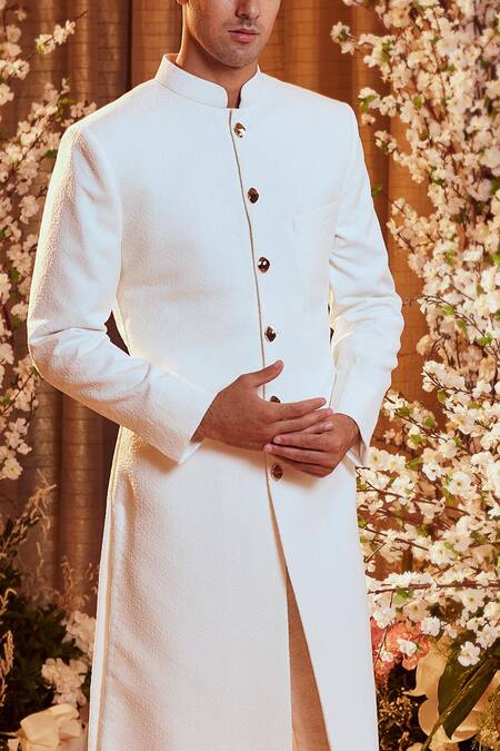 Jigar & Nikita_White Textured Sherwani And Churidar Set_Online_at_Aza_Fashions