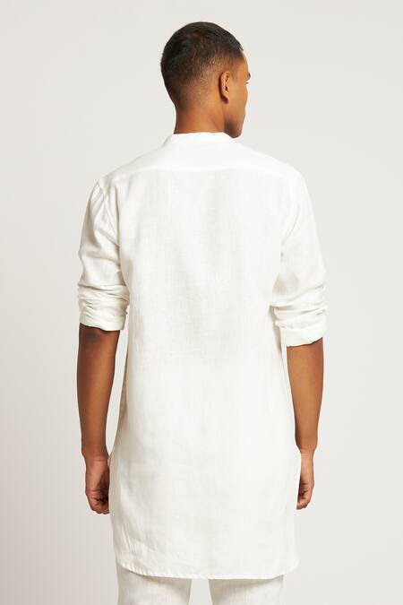 Shop Son Of A Noble Snob White 100% Linen Plain Ambar Asymmetric Kurta at Aza Fashions Shop_Son Of A Noble Snob_White 100% Linen Plain Ambar Asymmetric Kurta_at_Aza_Fashions