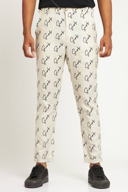 Buy Son Of A Noble Snob Ivory 100% Linen Printed Logo Toco Signature Trouser Online at Aza Fashions Buy_Son Of A Noble Snob_Ivory 100% Linen Printed Logo Toco Signature Trouser_Online_at_Aza_Fashions