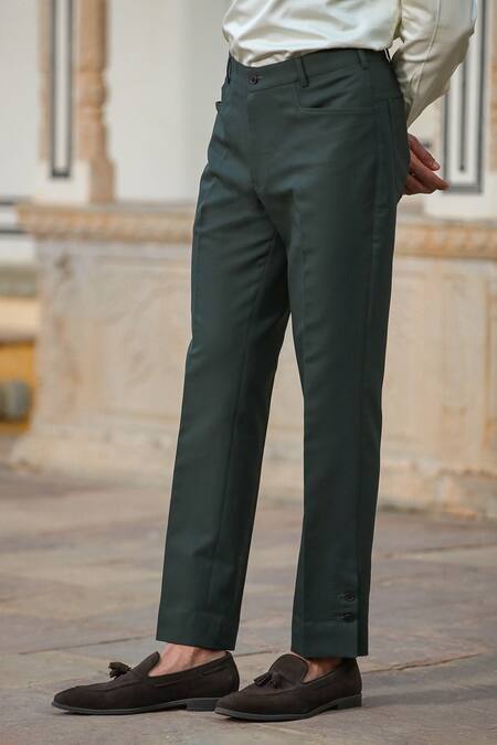 Shop Raw & Rustic By Niti Bothra Green Cotton Handcrafted Buttoned Hem Jeans Shop_Raw & Rustic By Niti Bothra_Green Cotton Handcrafted Buttoned Hem Jeans