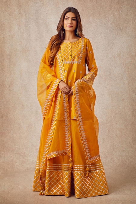 Shop Ajiesh Oberoi Yellow Organza, Chanderi Round Kurta Gharara Set at Aza Fashions Shop_Ajiesh Oberoi_Yellow Organza, Chanderi Round Kurta Gharara Set _at_Aza_Fashions
