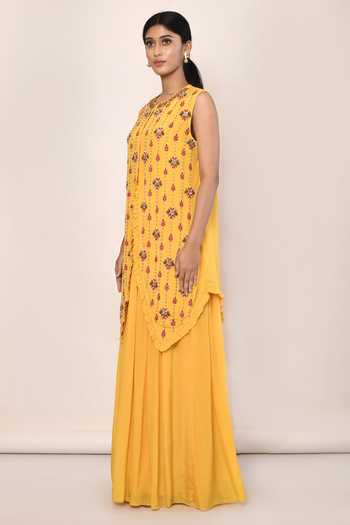 Shop_Naintara Bajaj_Yellow Asymmetric Kurta And Skirt Set_Online_at_Aza_Fashions