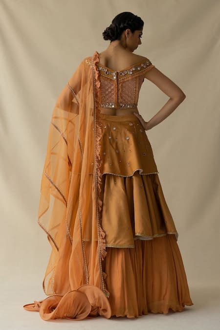 Shop Merge Design Orange Pearls And Mirrors One Shoulder Layered Lehenga Set With Ruffle Dupatta at Aza Fashions Shop_Merge Design_Orange Pearls And Mirrors One Shoulder Layered Lehenga Set With Ruffle Dupatta _at_Aza_Fashions
