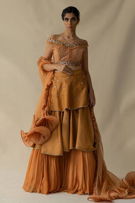 Buy Merge Design Orange Pearls And Mirrors One Shoulder Layered Lehenga Set With Ruffle Dupatta Online at Aza Fashions Buy_Merge Design_Orange Pearls And Mirrors One Shoulder Layered Lehenga Set With Ruffle Dupatta _Online_at_Aza_Fashions
