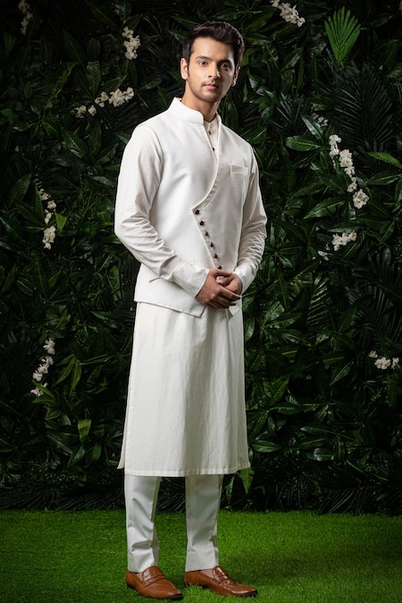 Shop Mirroir White Cotton Silk, Poly Blend, Suiting Asymmetric Bundi And Kurta Set at Aza Fashions Shop_Mirroir_White Cotton Silk, Poly Blend, Suiting Asymmetric Bundi And Kurta Set _at_Aza_Fashions
