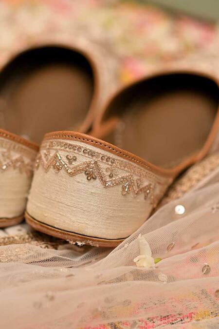 Shop Coral Haze Ivory Sequin Floral Zardozi Juttis Online at Aza Fashions Shop_Coral Haze_Ivory Sequin Floral Zardozi Juttis_Online_at_Aza_Fashions