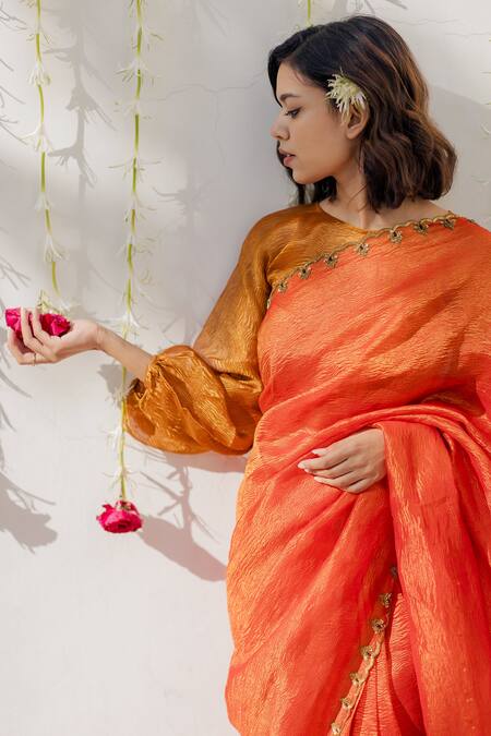 Mimamsaa_Orange Tissue Silk Embroidered And Woven Sequin Motifs Round Saree _at_Aza_Fashions