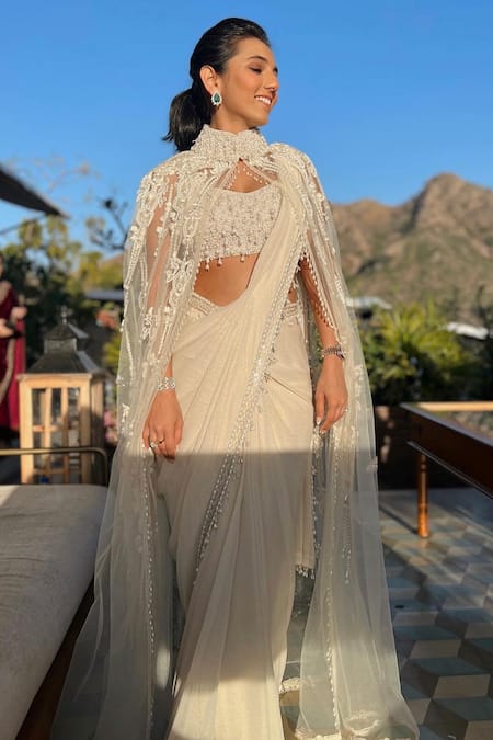 Buy Mala And Kinnary White Cape Net Saree Foil Georgette Pearls, Bead V Neck Embellished Set With Online at Aza Fashions Buy_Mala And Kinnary_White Cape Net Saree Foil Georgette Pearls, Bead V Neck Embellished Set With_Online_at_Aza_Fashions