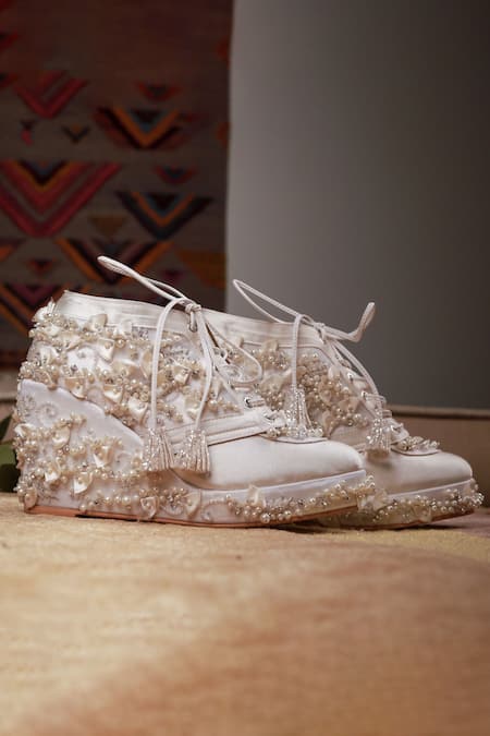 Shop Tiesta Ivory Cinderella Embellished Sneaker Wedges at Aza Fashions Shop_Tiesta_Ivory Cinderella Embellished Sneaker Wedges _at_Aza_Fashions