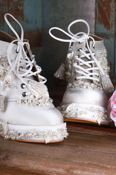 Buy Tiesta Ivory Cinderella Embellished Sneaker Wedges Online at Aza Fashions Buy_Tiesta_Ivory Cinderella Embellished Sneaker Wedges _Online_at_Aza_Fashions