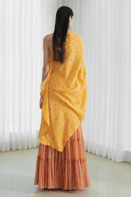 Shop_Mandira Wirk - Indian_Yellow Draped Kaftan Tunic And Sharara Set _at_Aza_Fashions