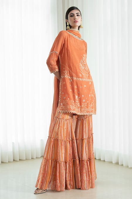 Mandira Wirk Orange Embroidery Round Foil Print Kurta Sharara Set 