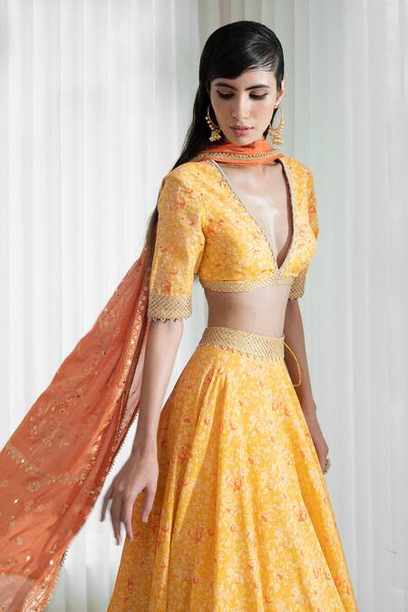 Shop Mandira Wirk - Indian Yellow Blouse And Lehenga Organic Cotton Dupatta Chiffon V Neck Printed Set Online at Aza Fashions Shop_Mandira Wirk - Indian_Yellow Blouse And Lehenga Organic Cotton Dupatta Chiffon V Neck Printed Set _Online_at_Aza_Fashions