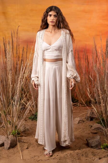 Label Reyya_Off White Rayon Lurex Patola Print, Crochet Lace And Sequin Work Tiered Pant Set_Online_at_Aza_Fashions