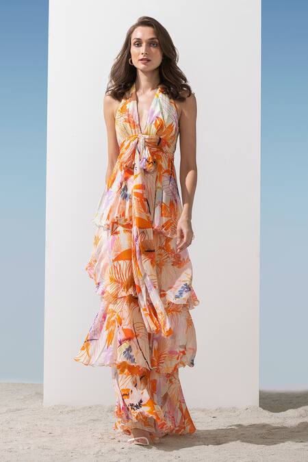 Shop Mandira Wirk Resort Orange Chiffon Floral Pattern Plunge V Neck Print Tiered Dress Online at Aza Fashions Shop_Mandira Wirk Resort_Orange Chiffon Floral Pattern Plunge V Neck Print Tiered Dress _Online_at_Aza_Fashions