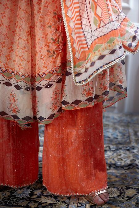 Mandira Wirk - Indian Peach Chanderi V Neck Kurta And Palazzo Set at Aza Fashions Mandira Wirk - Indian_Peach Chanderi V Neck Kurta And Palazzo Set _at_Aza_Fashions