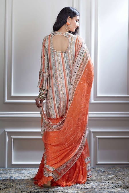 Shop Mandira Wirk - Indian Peach Chanderi V Neck Kurta And Sharara Set at Aza Fashions Shop_Mandira Wirk - Indian_Peach Chanderi V Neck Kurta And Sharara Set _at_Aza_Fashions