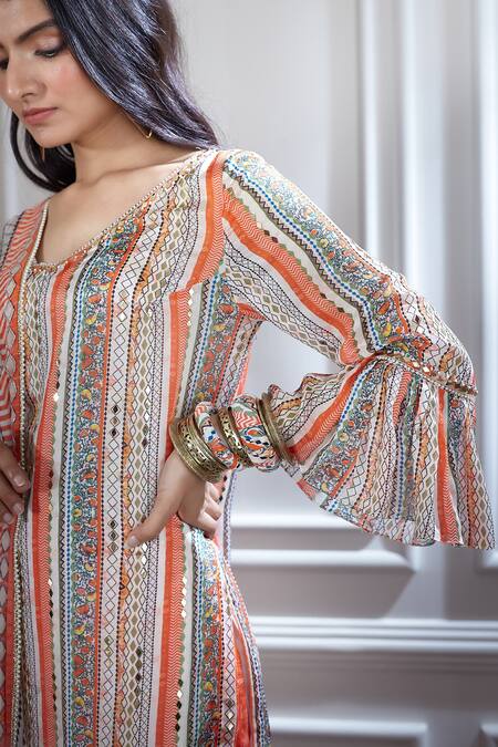 Buy Mandira Wirk - Indian Peach Chanderi V Neck Kurta And Sharara Set Online at Aza Fashions Buy_Mandira Wirk - Indian_Peach Chanderi V Neck Kurta And Sharara Set _Online_at_Aza_Fashions