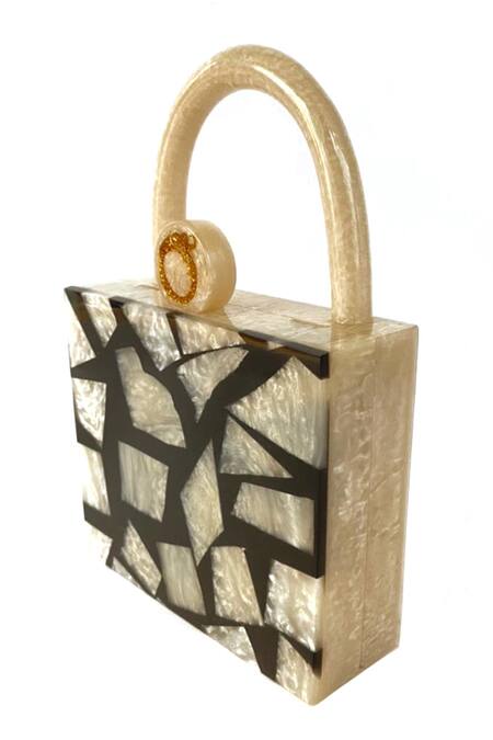 Shop_Oceana Clutches_Black Zebra Textured Handbag With U-shaped Handle_Online_at_Aza_Fashions