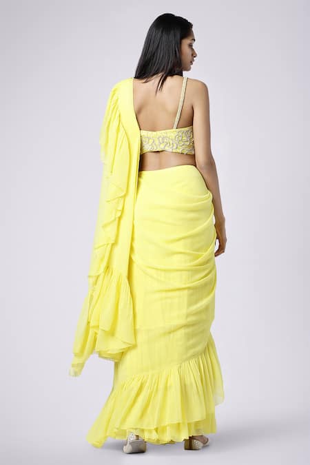 Shop Nayantaara Yellow Georgette Sweetheart Neck Pre-draped Ruffle Saree at Aza Fashions Shop_Nayantaara_Yellow Georgette Sweetheart Neck Pre-draped Ruffle Saree _at_Aza_Fashions