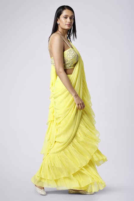 Nayantaara Yellow Georgette Sweetheart Neck Pre-draped Ruffle Saree Online at Aza Fashions Nayantaara_Yellow Georgette Sweetheart Neck Pre-draped Ruffle Saree _Online_at_Aza_Fashions