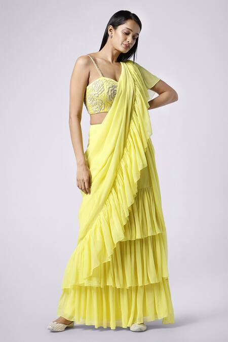 Buy Nayantaara Yellow Georgette Sweetheart Neck Pre-draped Ruffle Saree Online at Aza Fashions Buy_Nayantaara_Yellow Georgette Sweetheart Neck Pre-draped Ruffle Saree _Online_at_Aza_Fashions