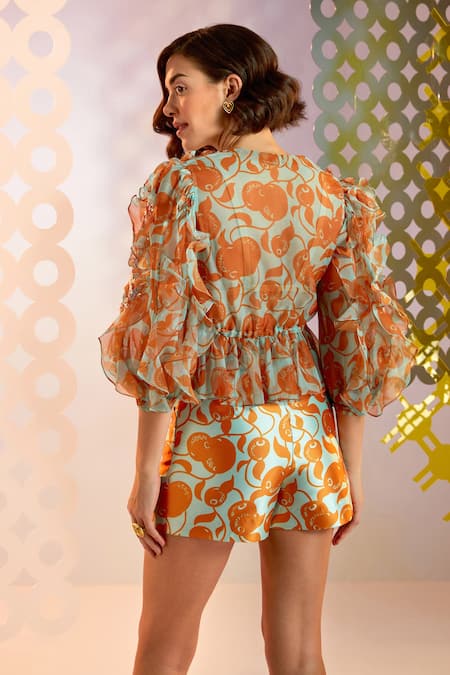 Shop Pankaj & Nidhi Blue Organza Abstract Print And Sequin Notched Naranjos Embellished Sheer Top at Aza Fashions Shop_Pankaj & Nidhi_Blue Organza Abstract Print And Sequin Notched Naranjos Embellished Sheer Top _at_Aza_Fashions