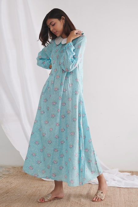 Shop Negra Elegante Blue Bemberg Muslin Floral Block Print Peter Pan Midi Dress at Aza Fashions Shop_Negra Elegante_Blue Bemberg Muslin Floral Block Print Peter Pan Midi Dress _at_Aza_Fashions