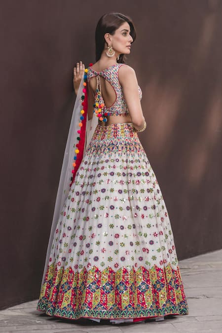 Shop Nitika Gujral White Lehenga And Blouse Georgette Dupatta Tulle V Neck Embroidered Bridal Set at Aza Fashions Shop_Nitika Gujral_White Lehenga And Blouse Georgette Dupatta Tulle V Neck Embroidered Bridal Set _at_Aza_Fashions