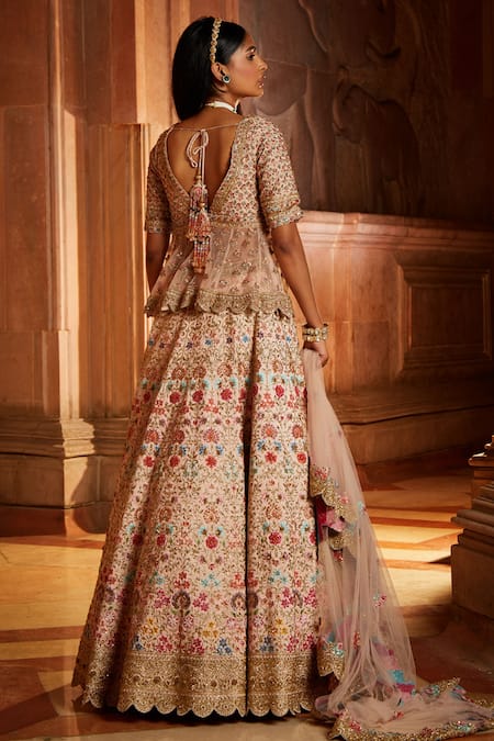 Shop Nitika Gujral Pink Raw Silk, Tulle Beads And Sequins, Embroidered Peplum Bridal Lehenga Set at Aza Fashions Shop_Nitika Gujral_Pink Raw Silk, Tulle Beads And Sequins, Embroidered Peplum Bridal Lehenga Set _at_Aza_Fashions
