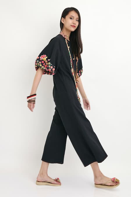 Nikasha_Black Polka Dots Round Silk Balloon Sleeve Jumpsuit _Online_at_Aza_Fashions