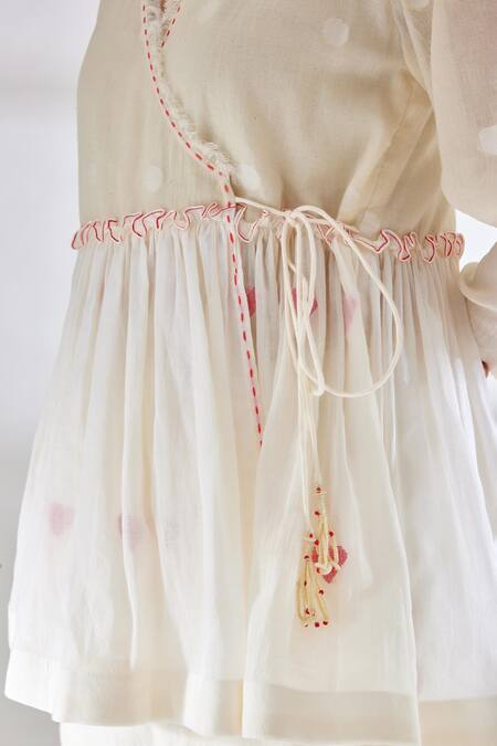 Nikasha_Cream Handwoven Jamdani Cotton Polka Dots V Neck Wrap Top _at_Aza_Fashions