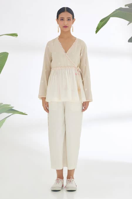 Nikasha_Cream Handwoven Jamdani Cotton Polka Dots V Neck Wrap Top _Online_at_Aza_Fashions
