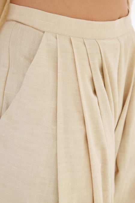 Nikasha_Cream Handwoven Cotton Pleated Pant _at_Aza_Fashions
