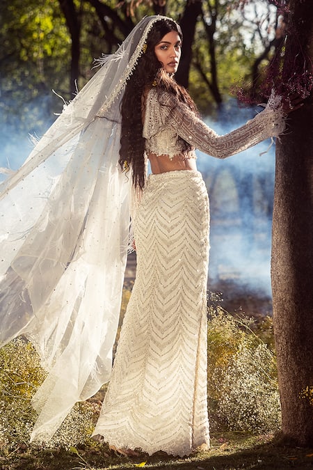 Nitika Gujral_Ivory Net, Satin Sequins, Crystals, Cut Work, And Embroidered Skirt & Veil Set _Online_at_Aza_Fashions