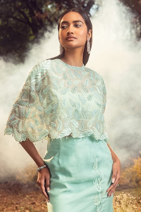 Nitika Gujral_Blue Lycra, Organza Sequins, Beads, Leaf Petal Embroidered Cape Skirt Set _Online_at_Aza_Fashions