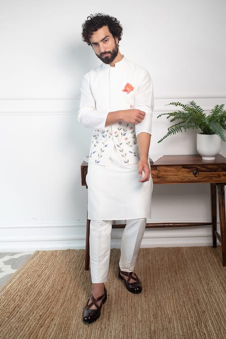 Shop Contrast By Parth White Pure Cotton Silk Floral Embroidered Bundi And Kurta Set at Aza Fashions Shop_Contrast By Parth_White Pure Cotton Silk Floral Embroidered Bundi And Kurta Set _at_Aza_Fashions