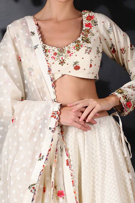 Nikasha White Handwoven Cotton Jamdani V Neck Lehenga Set at Aza Fashions Nikasha_White Handwoven Cotton Jamdani V Neck Lehenga Set _at_Aza_Fashions