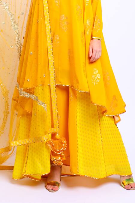 Nikasha_Yellow Net, Georgette Round Printed Asymmetric Kurta Set _at_Aza_Fashions