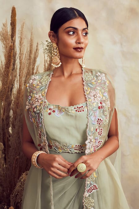 Niamh By Kriti Green Crepe And Silk Organza Pearls, Resham, Embroidered Cape & Draped Skirt Set at Aza Fashions Niamh By Kriti_Green Crepe And Silk Organza Pearls, Resham, Embroidered Cape & Draped Skirt Set _at_Aza_Fashions