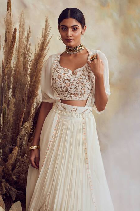Niamh By Kriti White Georgette And Organza Pearl, Bead & Cutdana Embroidered Cape Lehenga Set at Aza Fashions Niamh By Kriti_White Georgette And Organza Pearl, Bead & Cutdana Embroidered Cape Lehenga Set _at_Aza_Fashions
