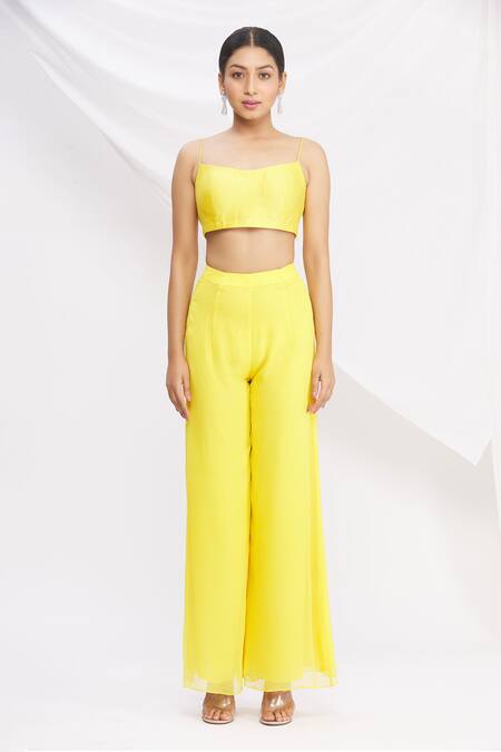 Buy Nitika Kanodia Gupta Yellow Asymmetric Kurta And Pant Set Online at Aza Fashions Buy_Nitika Kanodia Gupta_Yellow Asymmetric Kurta And Pant Set_Online_at_Aza_Fashions