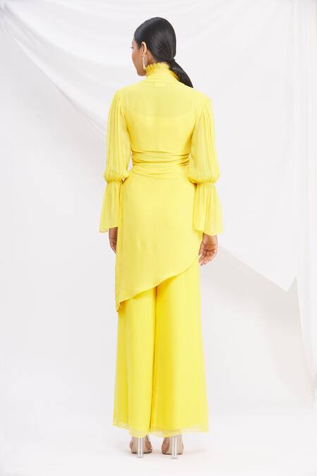Shop Nitika Kanodia Gupta Yellow Asymmetric Kurta And Pant Set at Aza Fashions Shop_Nitika Kanodia Gupta_Yellow Asymmetric Kurta And Pant Set_at_Aza_Fashions