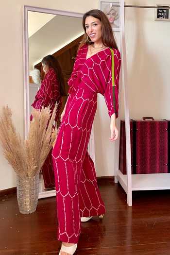 Nupur Kanoi_Pink Crepe V Neck Bandhani Print Knotted Jumpsuit_Online_at_Aza_Fashions