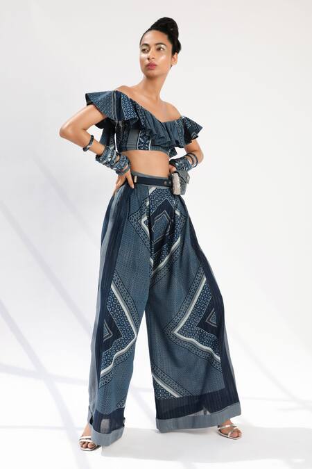 Nikita Mhaisalkar_Blue Lurex Georgette V Neck Tile Print Ruffle Top_Online_at_Aza_Fashions